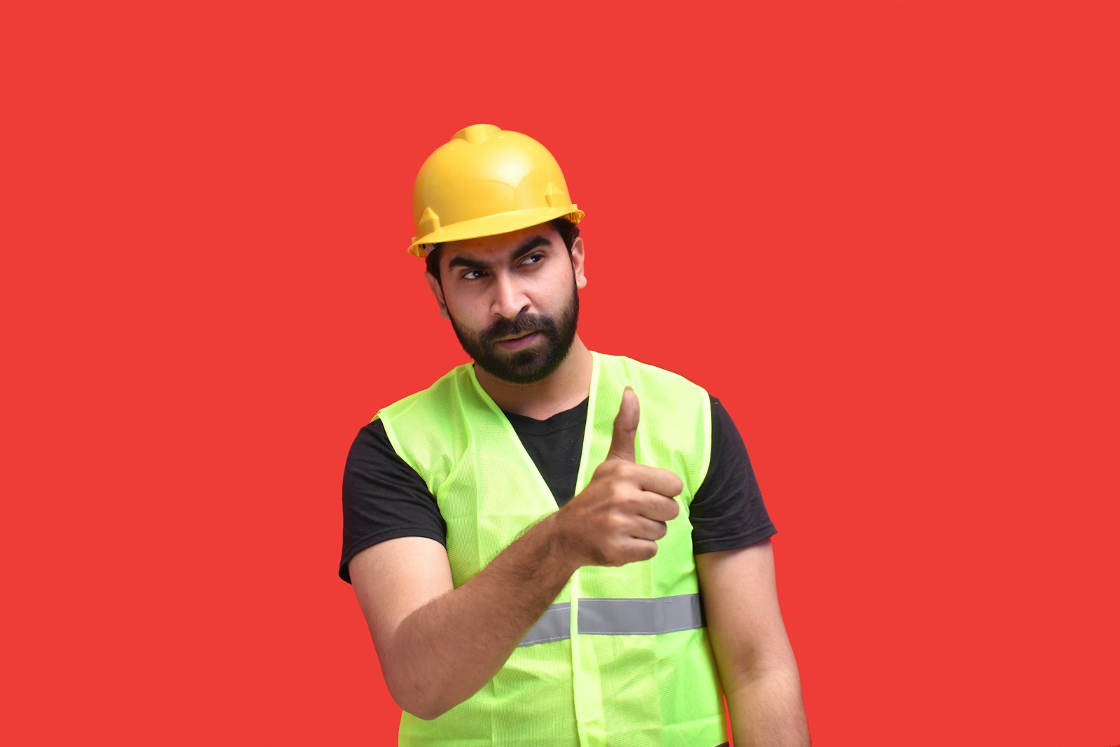 a person wearing a yellow hard hat